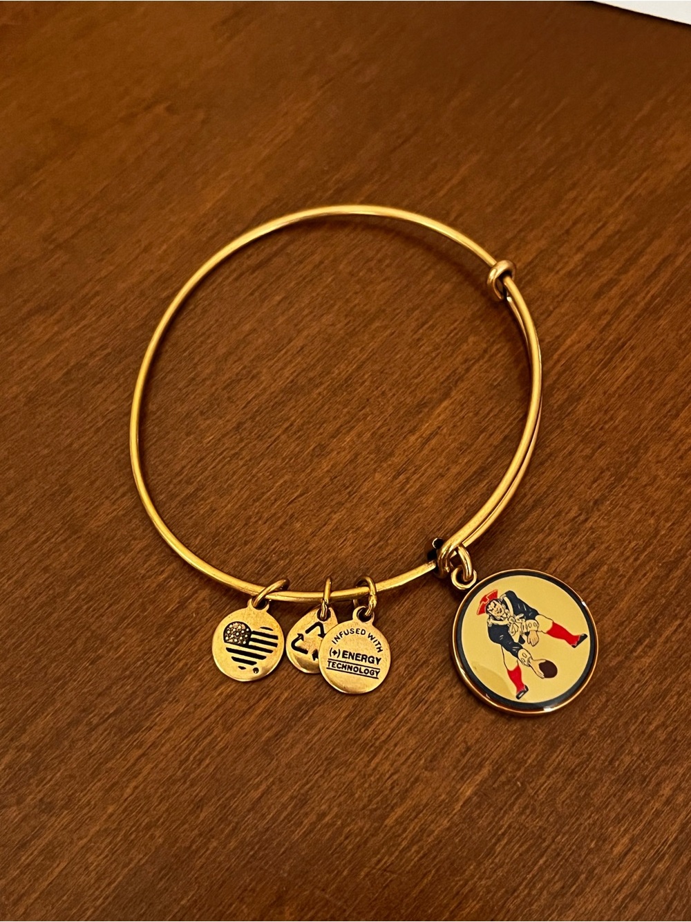 Alex and Ani Gold Tone bracelet, NFL Patriot’s Charm